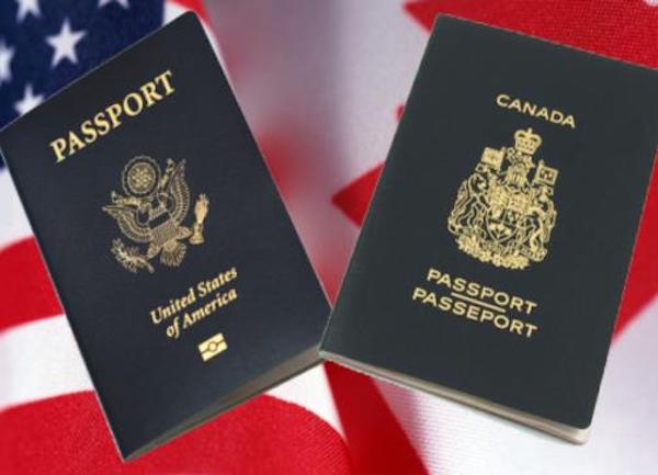 photo of an American and a Canadian passport